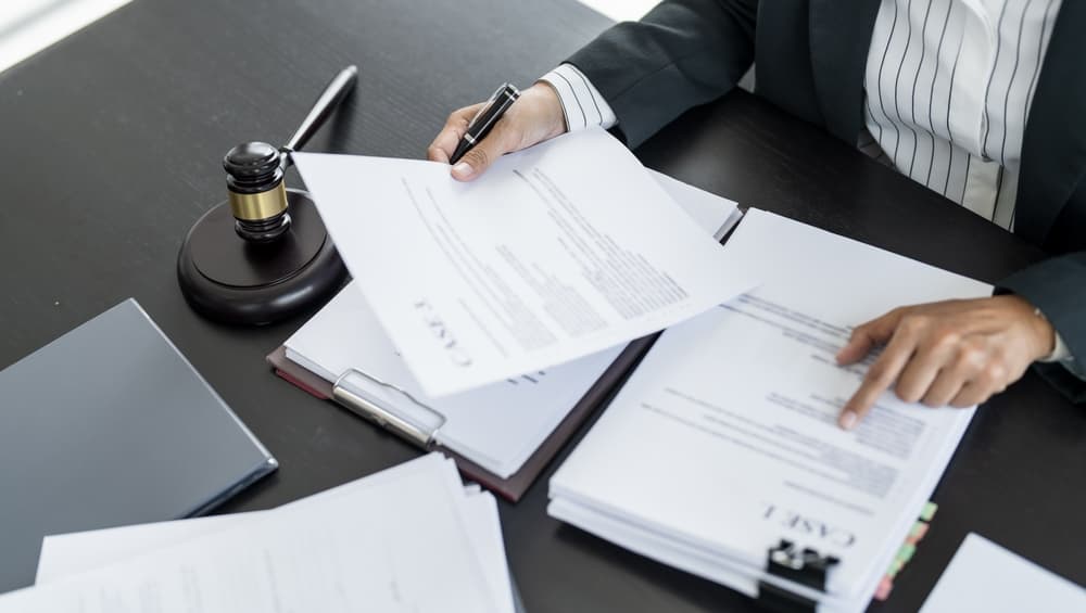 Lawyer businessman working with lawbook in office or courtroom Legal counsel