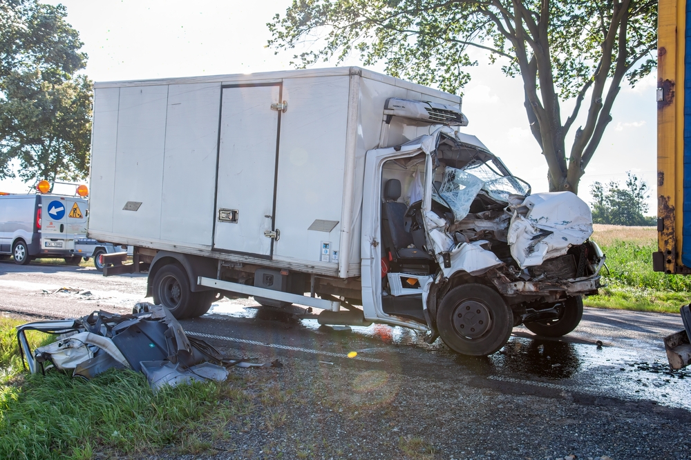 Accident between a delivery car and a truck