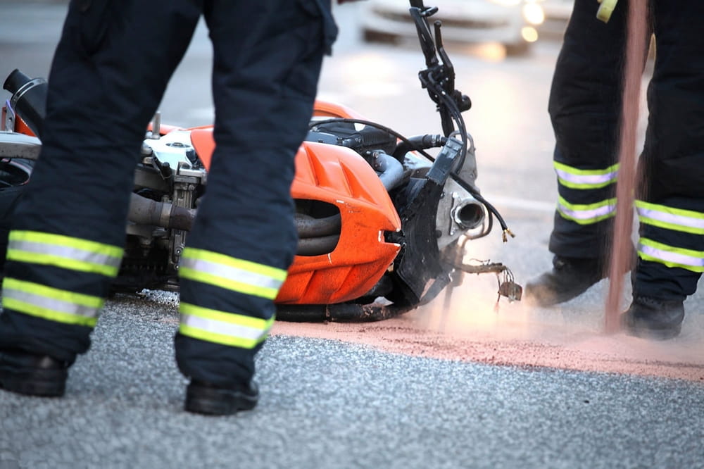 Emergency responders working at the scene of a motorcycle accident in Los Angeles.
